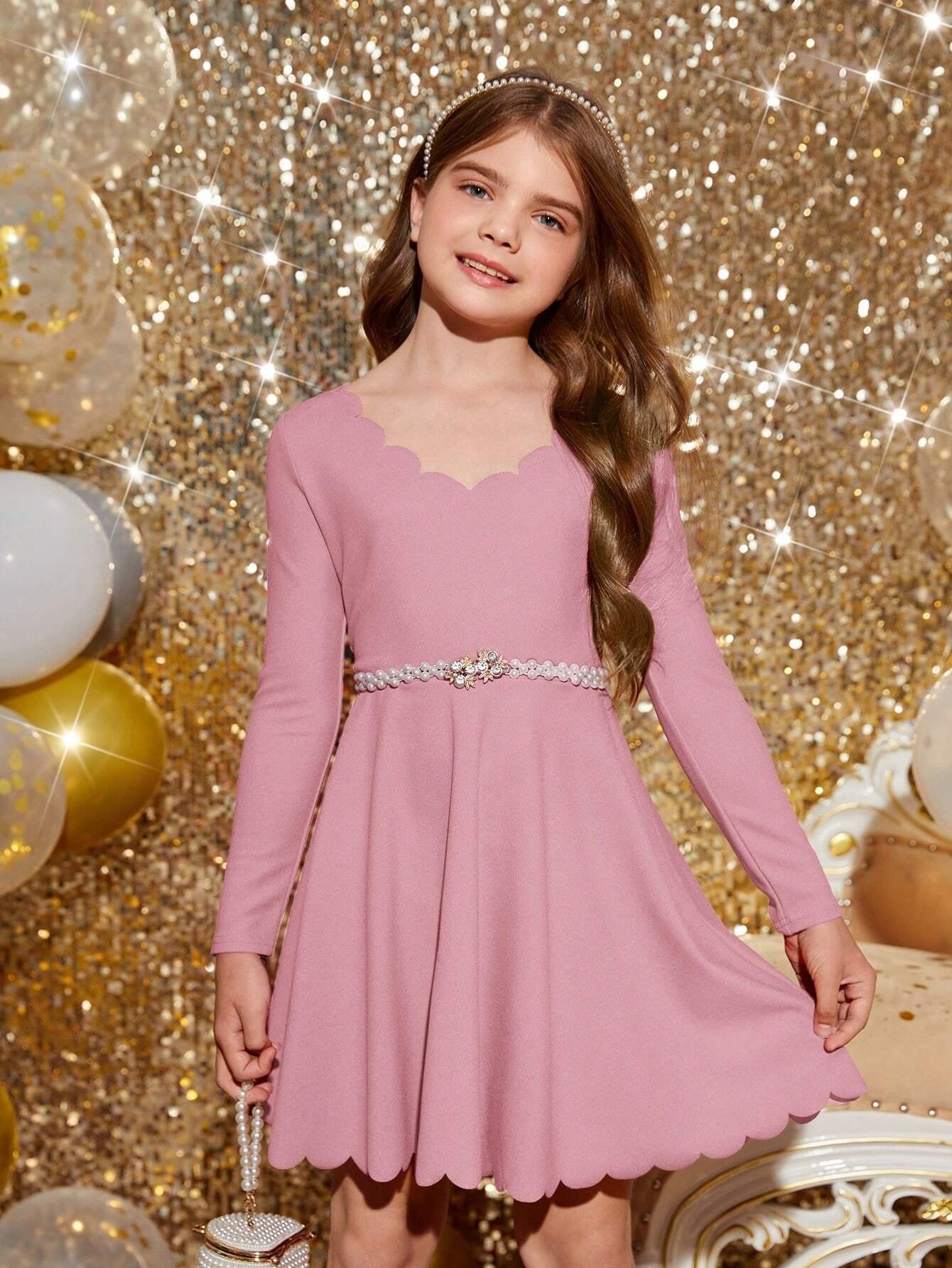 Vestido Rosa Pálido con Diseño Acampanado para Niña