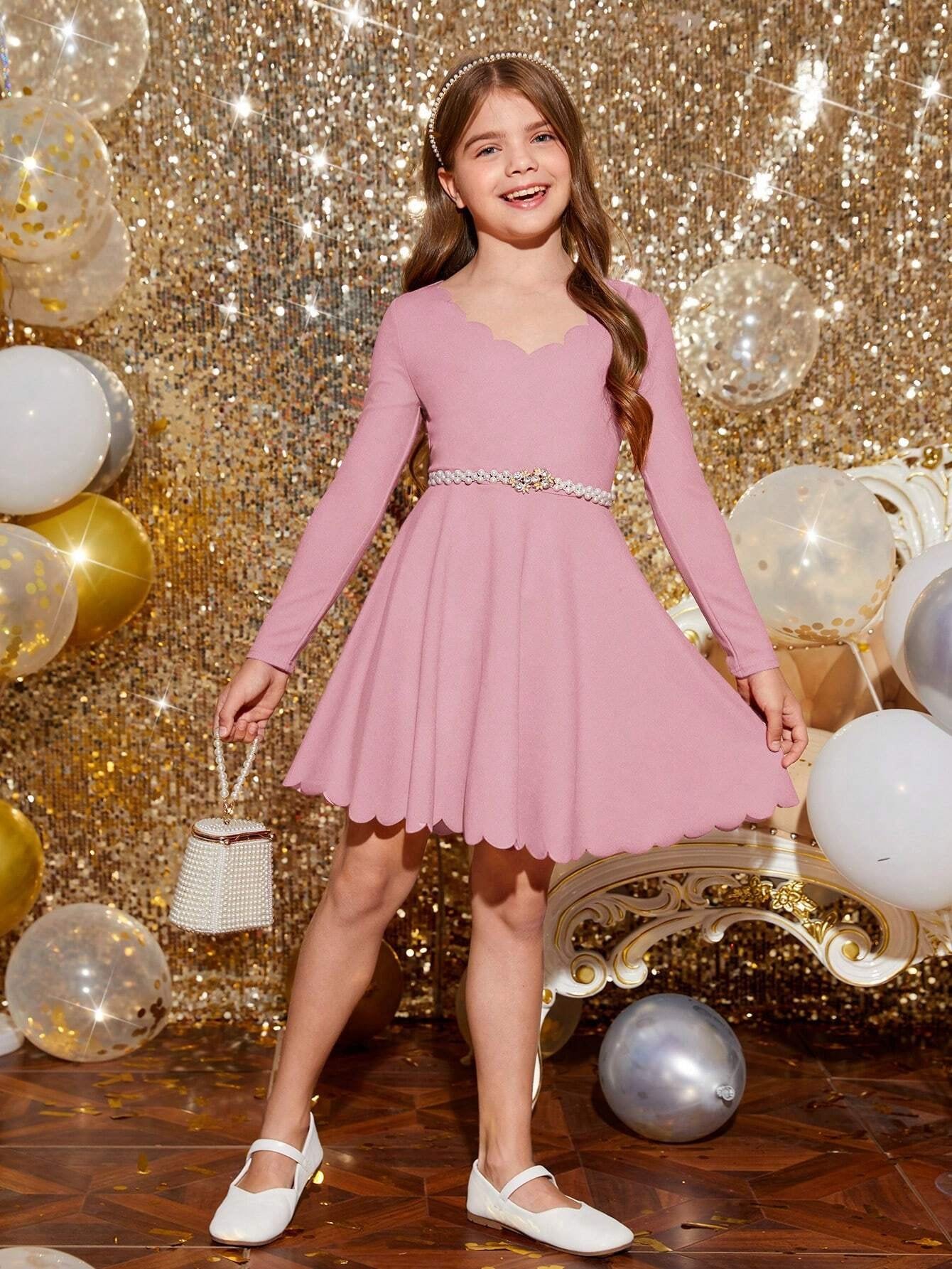 Vestido Rosa Pálido con Diseño Acampanado para Niña