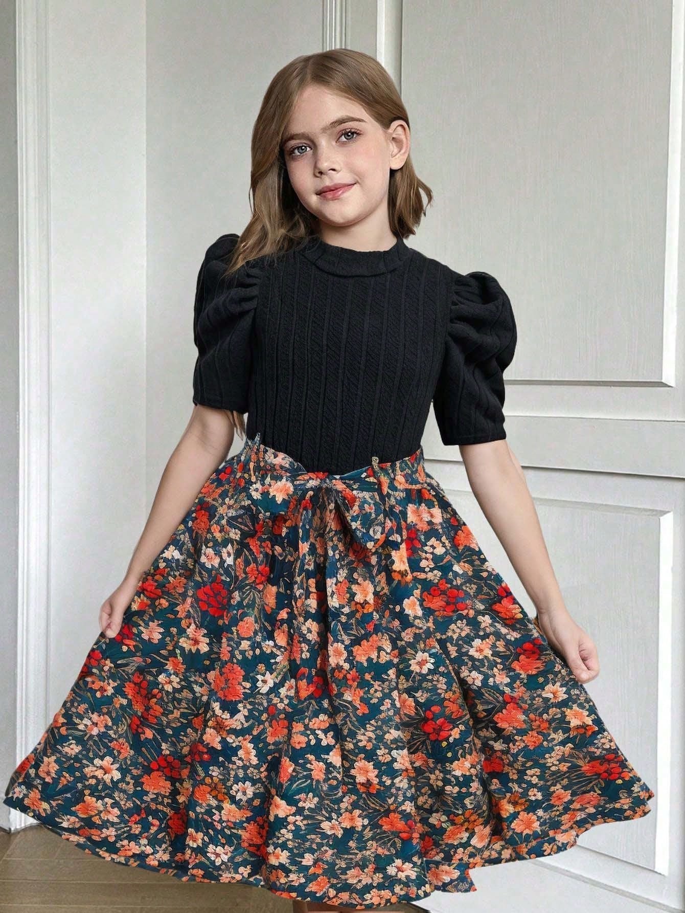 Vestido midi floral para niñas con mangas farol y cinturón decorativo, vista frontal.