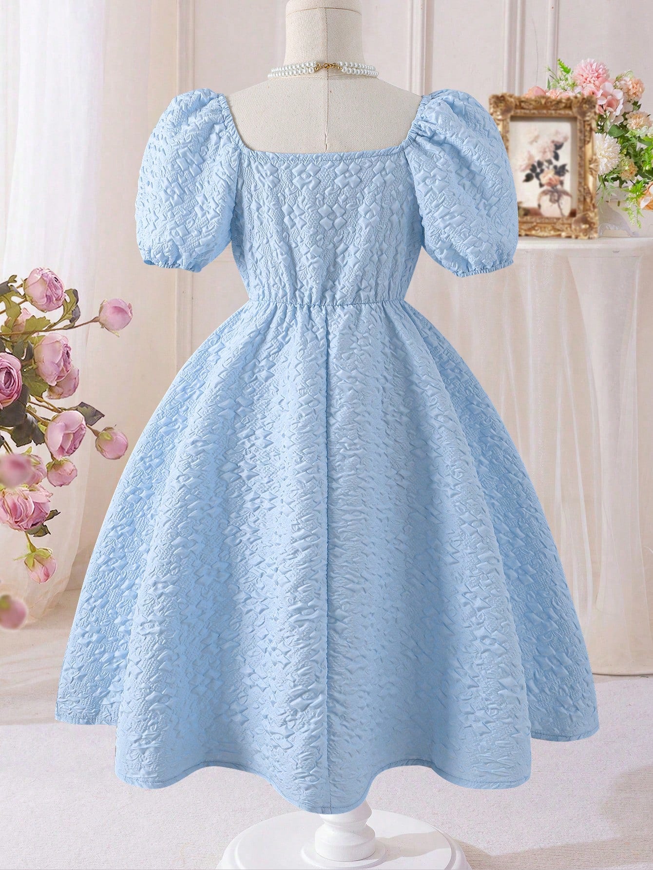 Vestido Celeste Texturizado Con Lazo Para Niña