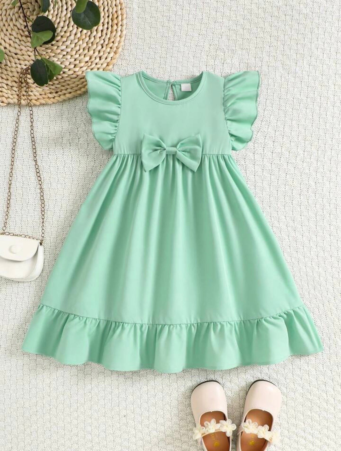 Vestido de verano sin mangas con volantes y lazo