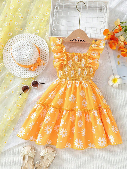Vista posterior del vestido amarillo floral con escote cuadrado.