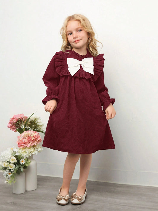 Vestido Burdeos Con Moño Grande Y Volantes Para Niñas
