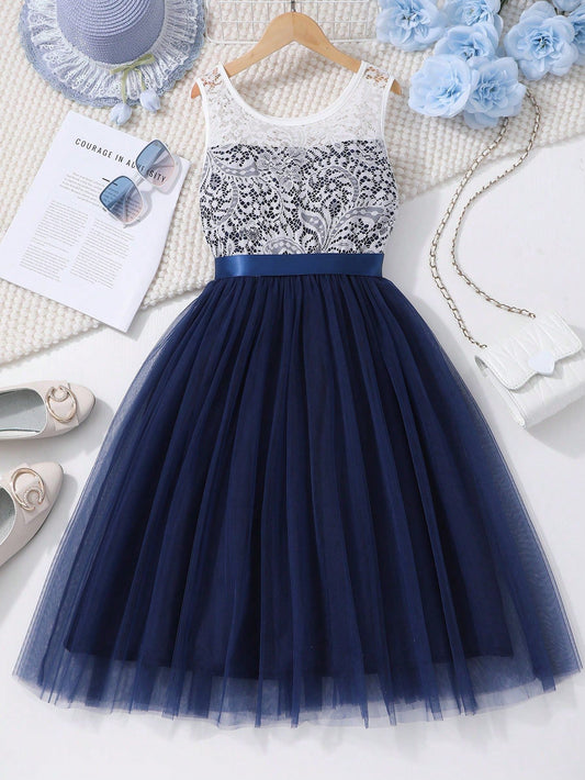 Vestido elegante azul marino para niña con encaje y falda de tul, ideal para ocasiones especiales.