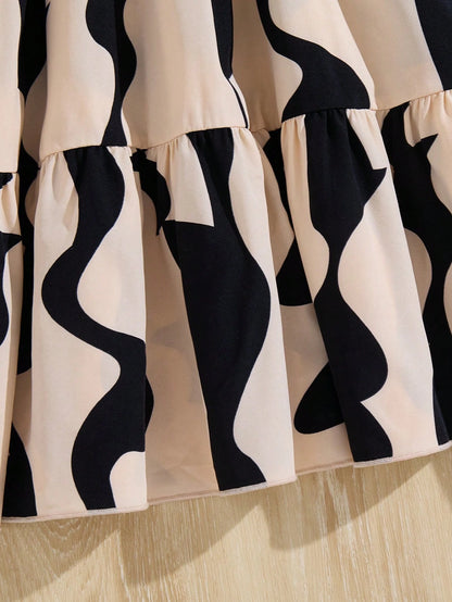 Vestido Negro Con Tirantes Y Estampado De Corazones Para Niña