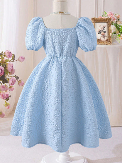 Vestido Celeste Texturizado Con Lazo Para Niña
