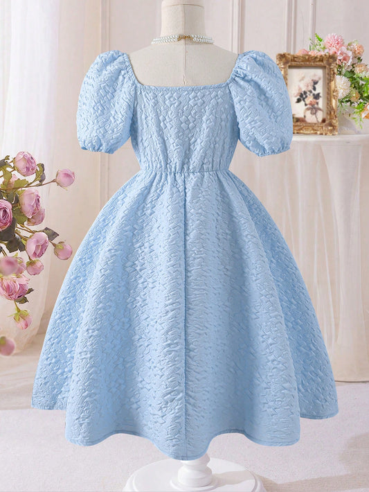 Vestido Celeste Texturizado Con Lazo Para Niña