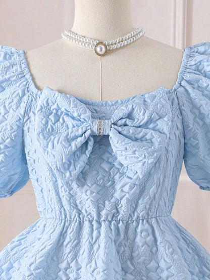 Vestido Celeste Texturizado Con Lazo Para Niña