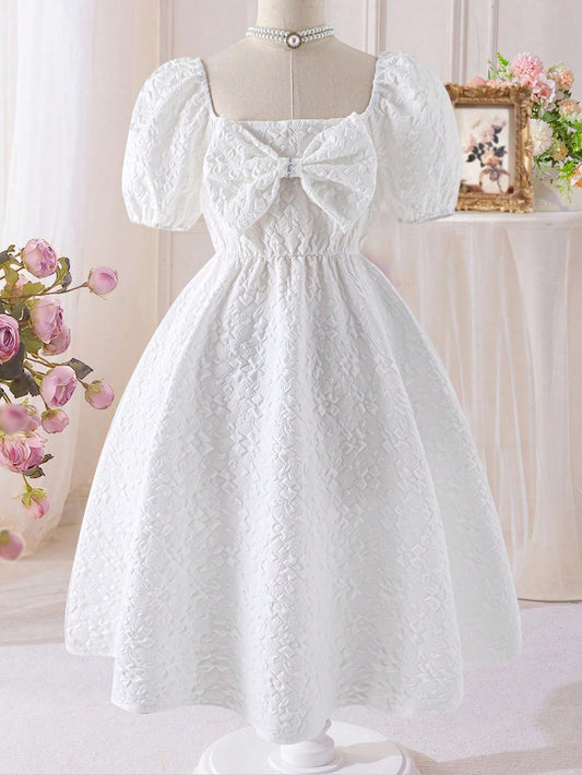 Vestido Blanco Texturizado Con Lazo Grande Para Niña
