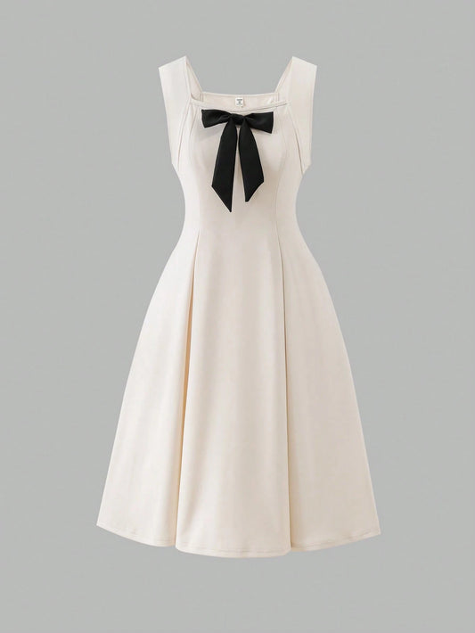 Vestido Beige Con Moño Negro Elegante Para Adolescente