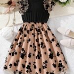 Vestido línea A para niñas con falda de tul y volantes en gasa, ideal para eventos especiales.