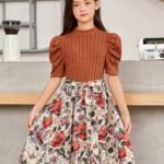 Imagen frontal: Vestido elegante floral óxido marrón para niña con cuello alzado y falda acampanada.